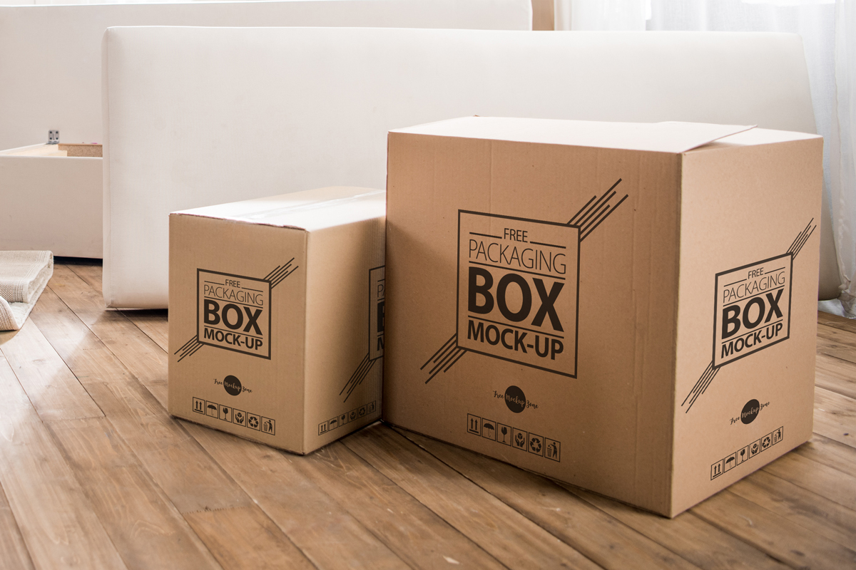 Free Packaging Box On Wooden Floor PSD MockupFree Mockup Zone