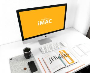 Free-iMac-on-Designer-Workspace-Mockup