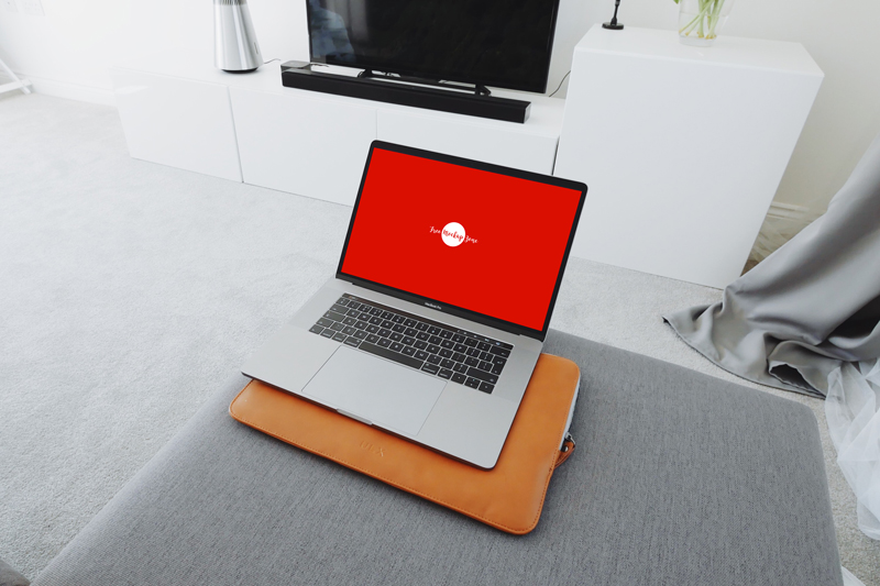 Free-MacBook-Pro-in-Living-Room-Mockup-2018