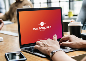 Free-Person-Using-MacBook-Pro-Mockup-PSD-2018-300.jpg