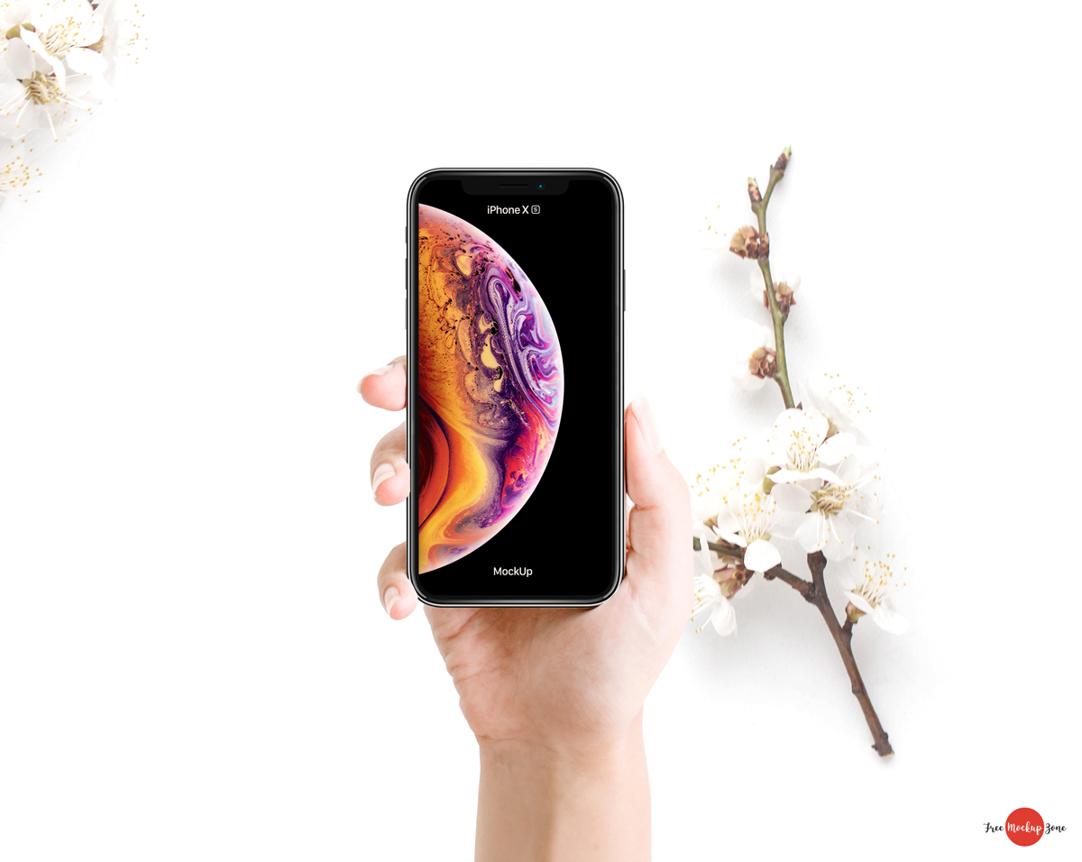 Free-Woman-Holding-iPhone-XS-Mockup-PSD-With-Flowers