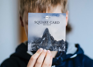 Free-Little-Boy-Showing-Square-Card-Mockup-PSD-300.jpg
