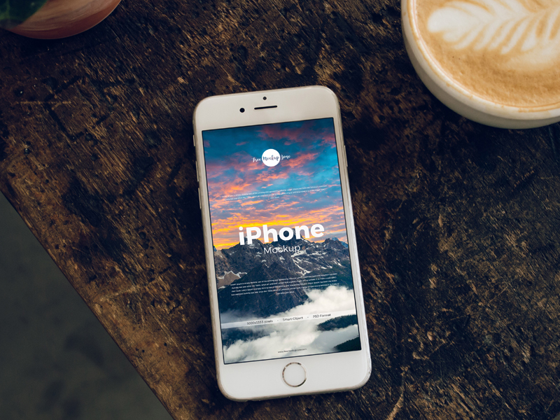 Free-iPhone-With-Coffee-Cup-Mockup-600