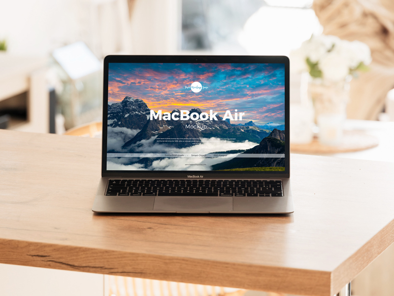 Free-Interior-MacBook-Air-on-Table-Mockup