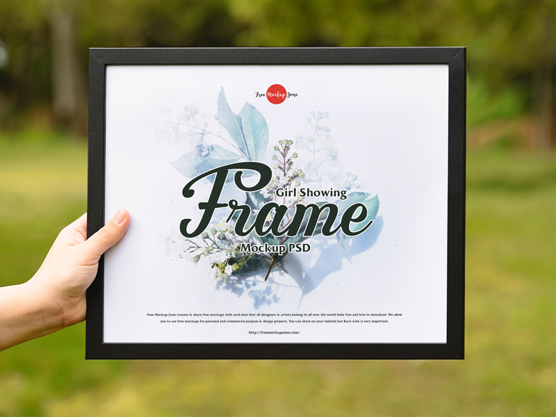 Free-Girl-Showing-Frame-Mockup-PSD-600