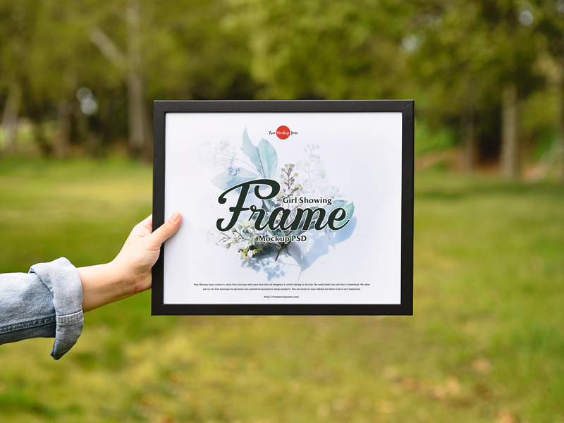 Free-Girl-Showing-Frame-Mockup-PSD