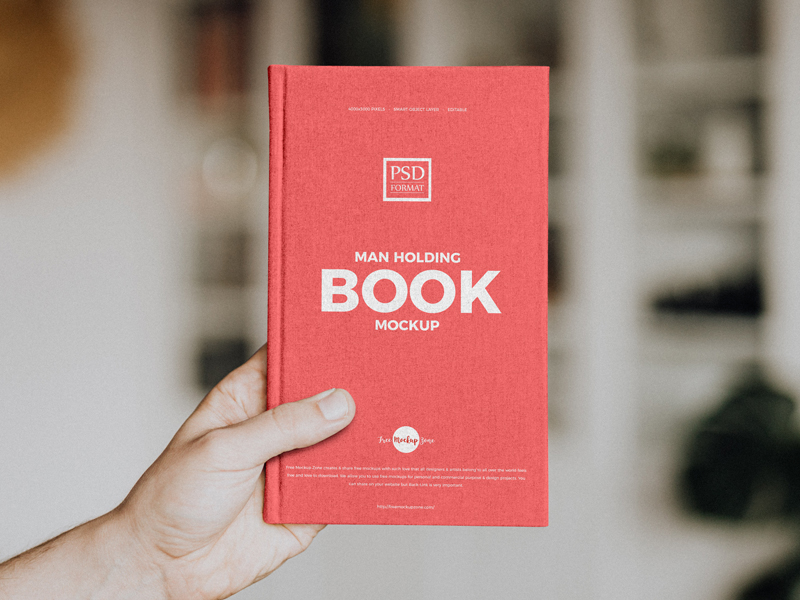 Free-Man-Holding-Book-Mockup