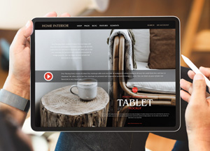 Free-Person-Working-on-Tablet-Mockup-300.jpg