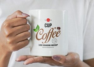 Free-Girl-Holding-Coffee-Cup-For-Logo-Branding-Mockup-300.jpg