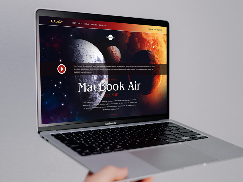 Free-Person-Holding-MacBook-Air-Mockup-600