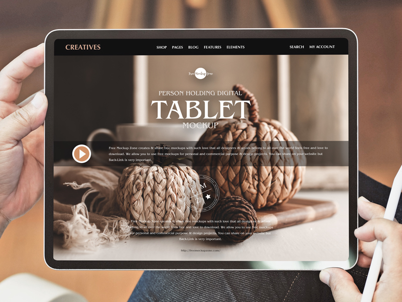 Free-Person-Holding-Digital-Tablet-Mockup-600
