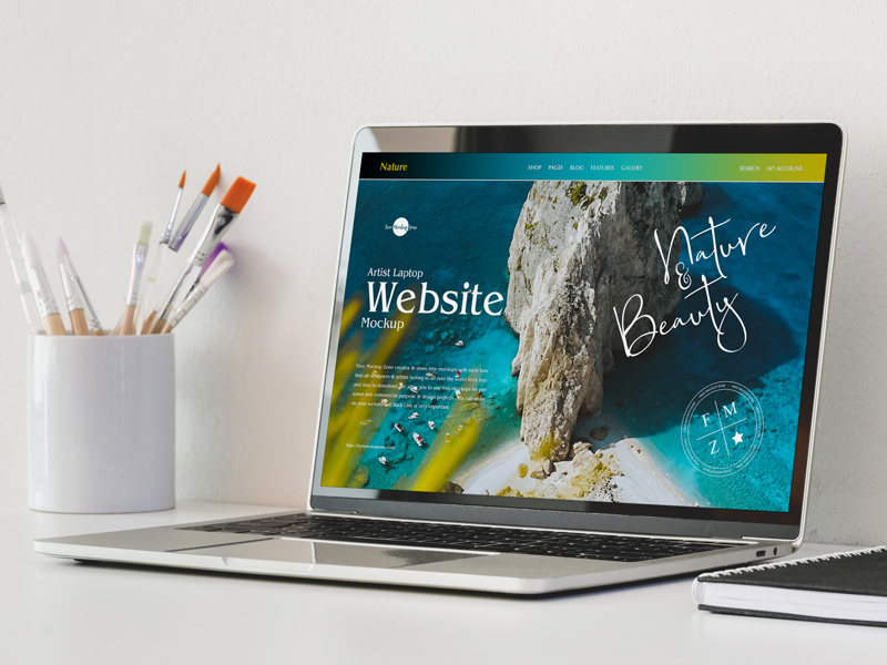 Free-Artist-Laptop-Website-Mockup-600