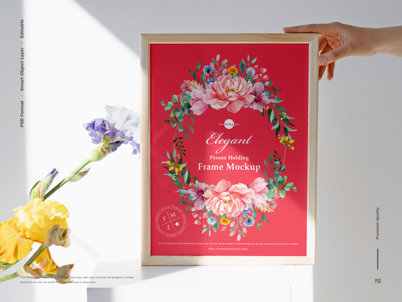 Free-Elegant-Person-Holding-Frame-Mockup