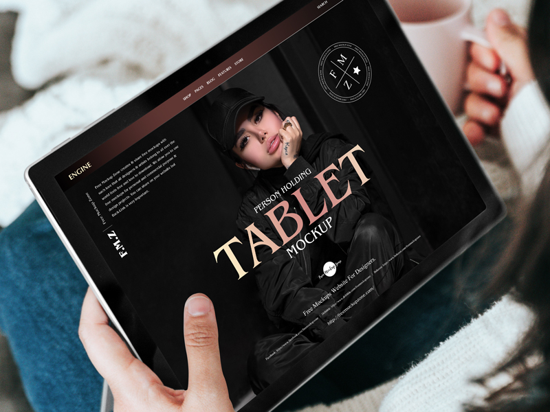 Free-Person-Holding-Tablet-Mockup-PSD-600