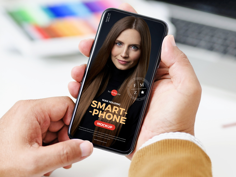 Free-High-Quality-Person-Using-Smartphone-Mockup