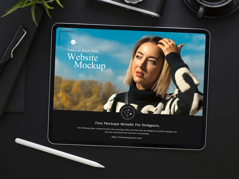 Free-Tablet-on-Black-Table-Website-Mockup