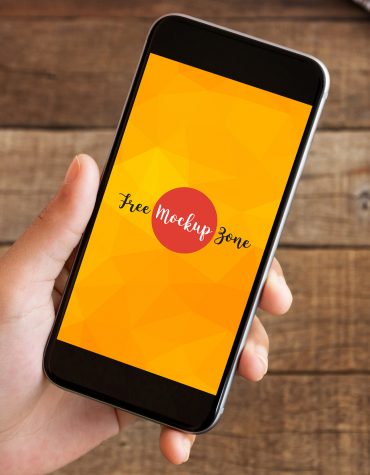 Free Hand Holding Clean Smartphone Mockup - Free Mockup ZoneFree Mockup Zone