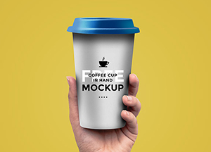 Free Coffee Cup In Hand Mockup-preview image