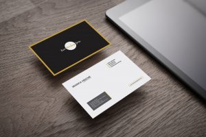 Free-Business-Card-on-Wooden-Table-Mockup