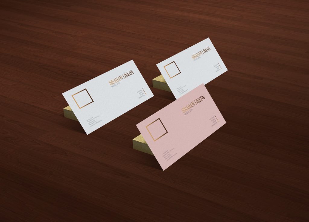 Free Business Card on Wooden Floor MockupFree Mockup Zone