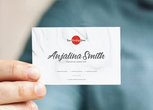 Free-Man-Holding-in-Hand-Business-Card-Mockup-PSD-2018-300