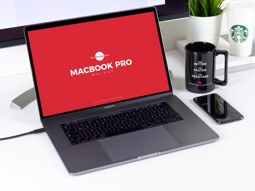 Free Workstation MacBook Pro Mockup PSD Beside Smartphone