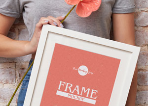Free-Girl-Showing-PSD-Frame-Mockup-Design-300