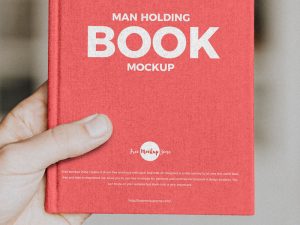 Free-Man-Holding-Book-Mockup-600