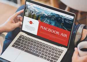 Free-Man-Using-MacBook-Air-Mockup-300.jpg