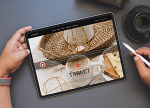 Free-Designer-Working-on-Tablet-Mockup-300