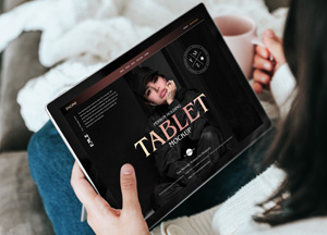 Free-Person-Holding-Tablet-Mockup-PSD-300