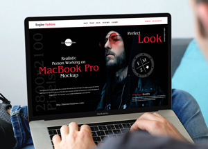 Free-Realistic-Person-Working-on-MacBook-Pro-Mockup-300