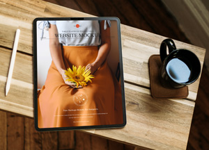 Free-Tablet-Placing-on-Wooden-Table-Website-Mockup-300