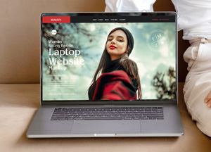 Free-Woman-Sitting-Beside-Laptop-Website-Mockup-300