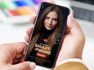 Free-High-Quality-Person-Using-Smartphone-Mockup-600