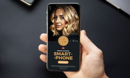 Free-High-Quality-Person-Showing-Smartphone-Mockup-300