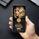 Free-High-Quality-Person-Showing-Smartphone-Mockup-300